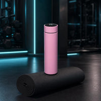 Dromy Bottle rosa en gimnasio nocturno